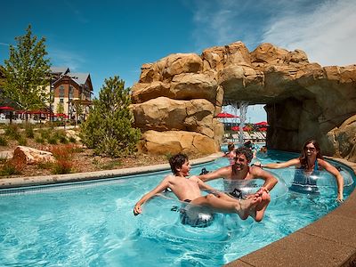Family in Lazy River at Arapahoe Springs at Gaylord Rockies