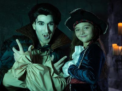 Guests in Dracula and Pirate costumes