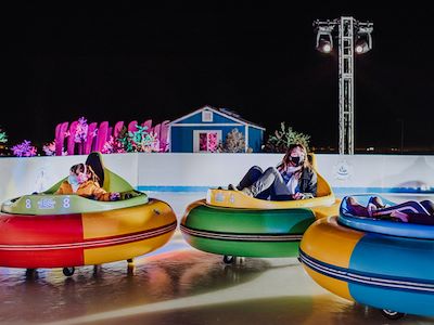 Guests on bumper cars on ice