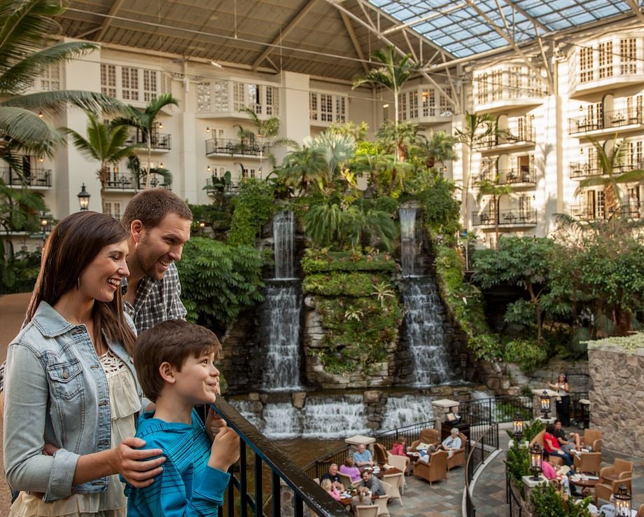 Family overlooking Cascades Restaurant at Gaylord Opryland