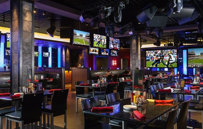 fuse sport bar interior with large TV screens