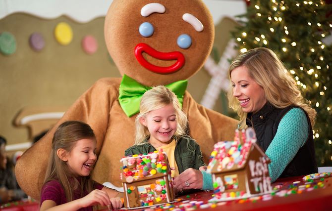 Family at table with Gingerbread character at Gaylord Palms