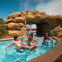 Family in tubes on Lazy River at Arapahoe Springs at Gaylord Rockies