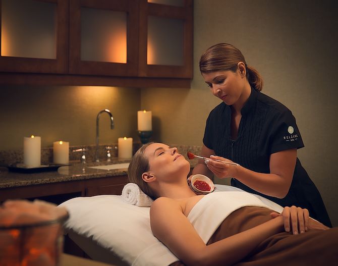 Woman getting treatment at Relache Spa at Gaylord Texan