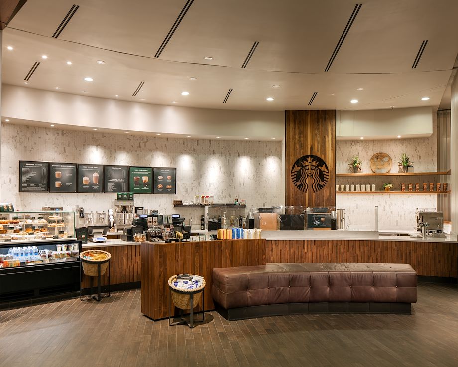 Starbucks restaurant service counter and seating area.