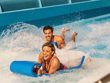SoundWaves indoor water attractions, flowrider and water slides