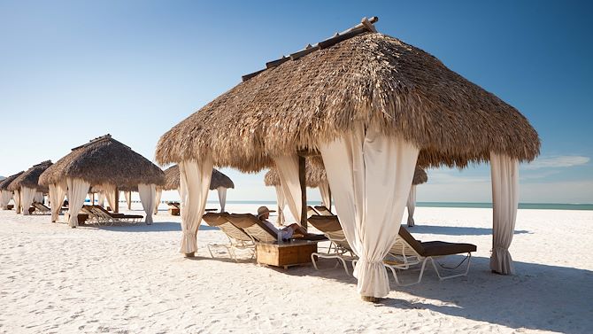 Beach Chickee Huts, Cabanas & Premium Pool Chairs
